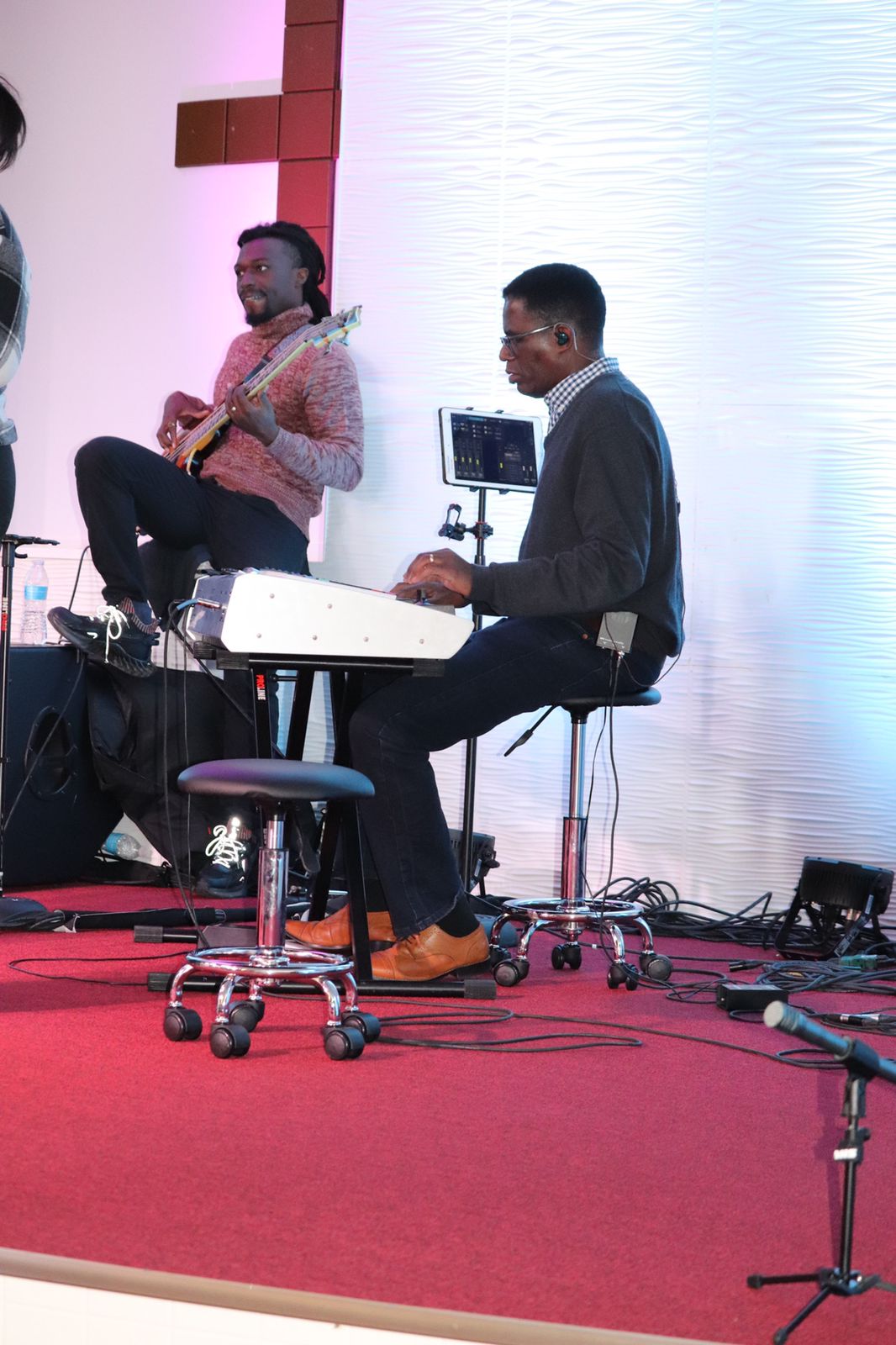 Worship musicians playing instruments during a service