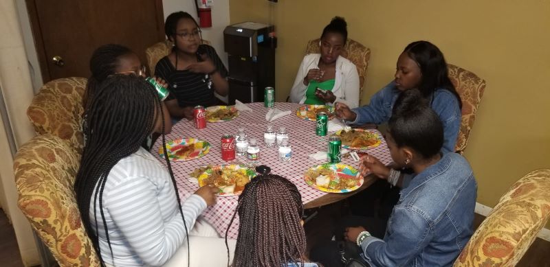 Guests connecting over refreshments at Gospel Outreach Center